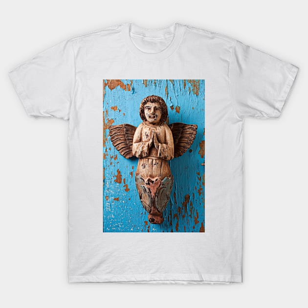 Angel on blue wooden wall T-Shirt by photogarry